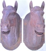 MATCHING PAIR OF HEAVY CAST IRON EXTERIOR HORSE HEAD MASKS