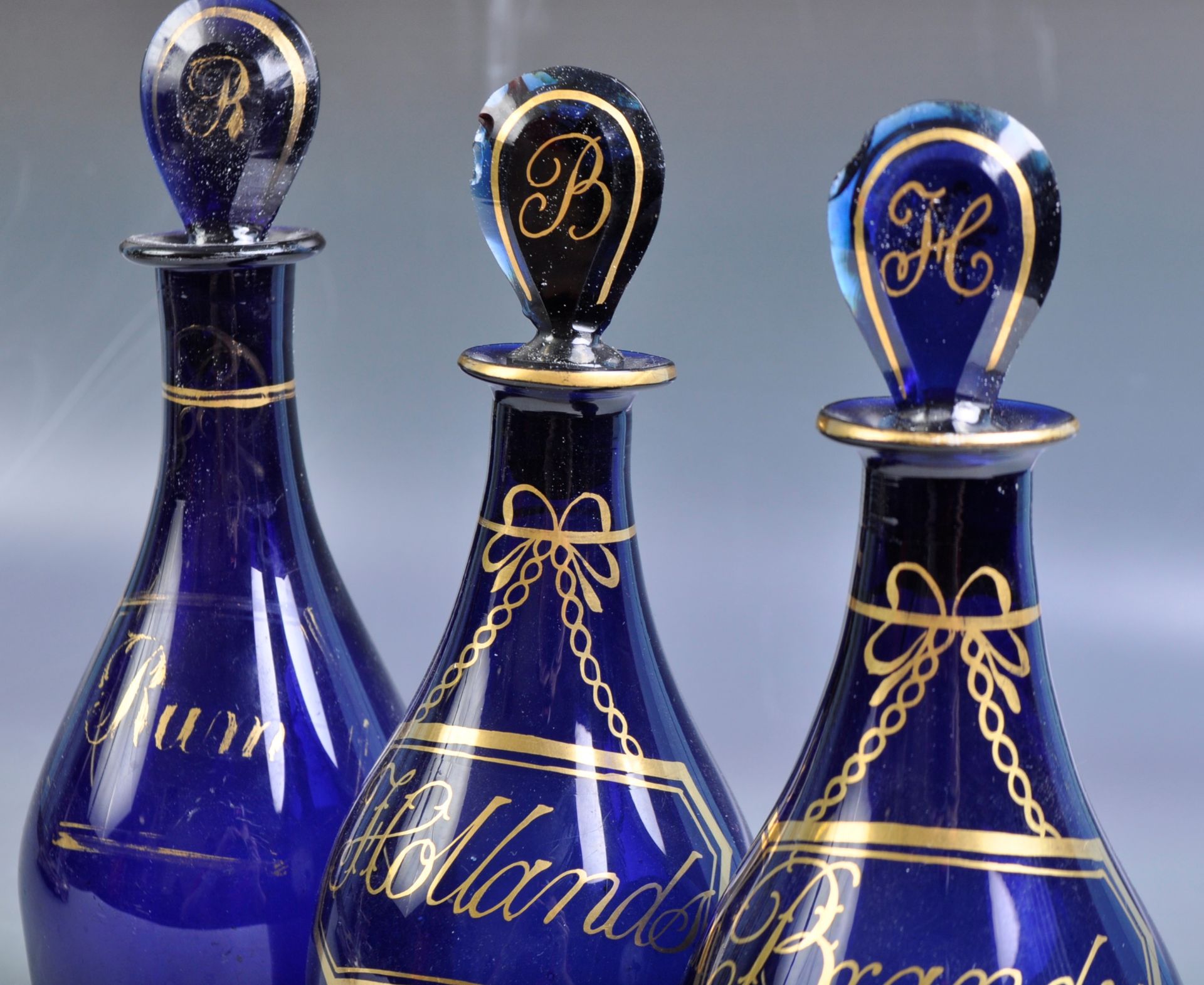 SET OF GEORGIAN BRISTOL BLUE DECANTER BOTTLES IN STAND - Image 6 of 7