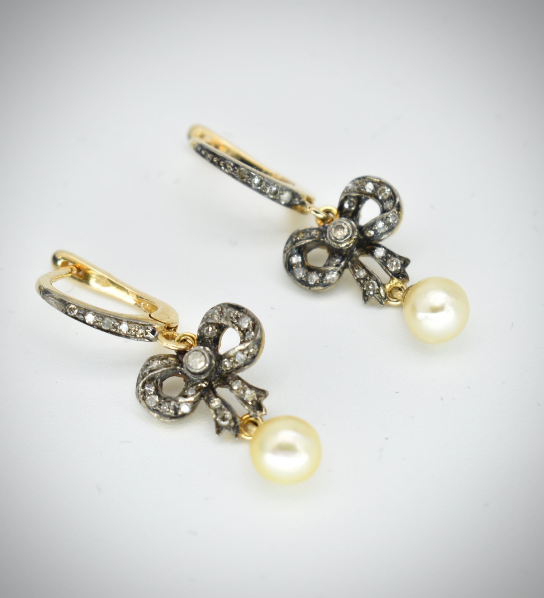 A Pair of 585 & Silver Gold Pearl & Diamond Earrings