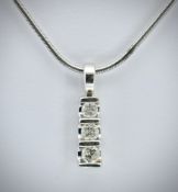 9CT WHTE GOLD AND DIAMOND PENDANT