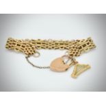 Victorian 19th century 9ct gold bracelet and harp charm