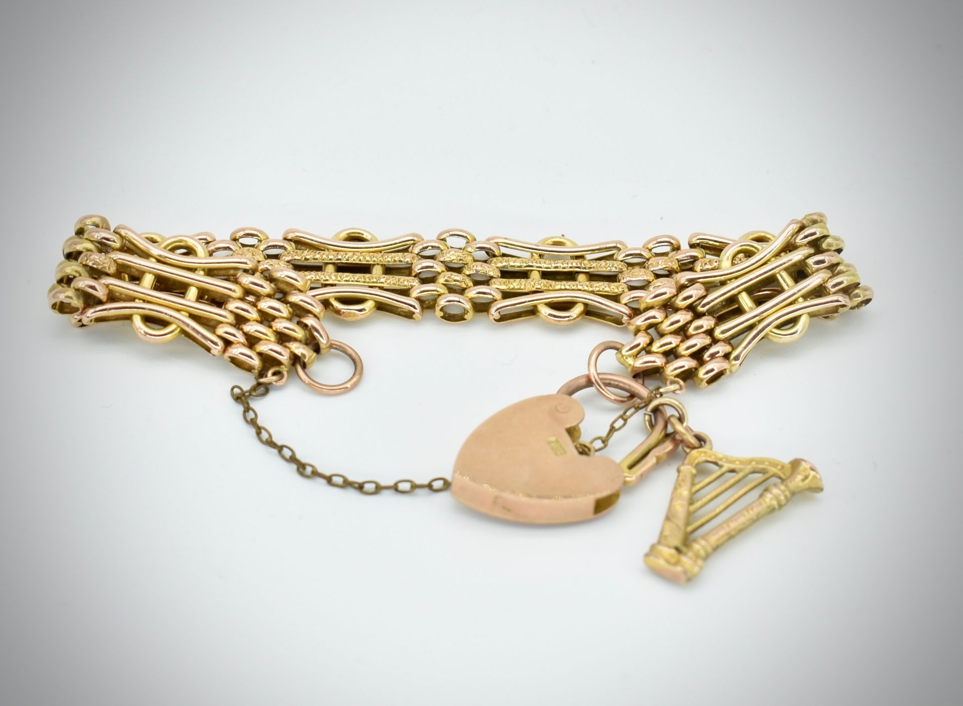 Victorian 19th century 9ct gold bracelet and harp charm