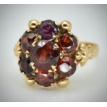 An 18ct Gold & Garnet Cluster Ring