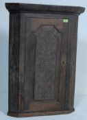 19TH CENTURY MAHOGANY CORNER CABINET WITH HAND CARVED DETAILING