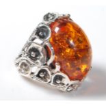 A 925 SILVER AND FAUX AMBER ART NOUVEAU STYLE DRESS RING