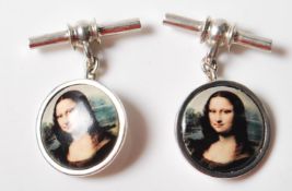 PAIR OF .925 SILVER MONA LISA EARRINGS