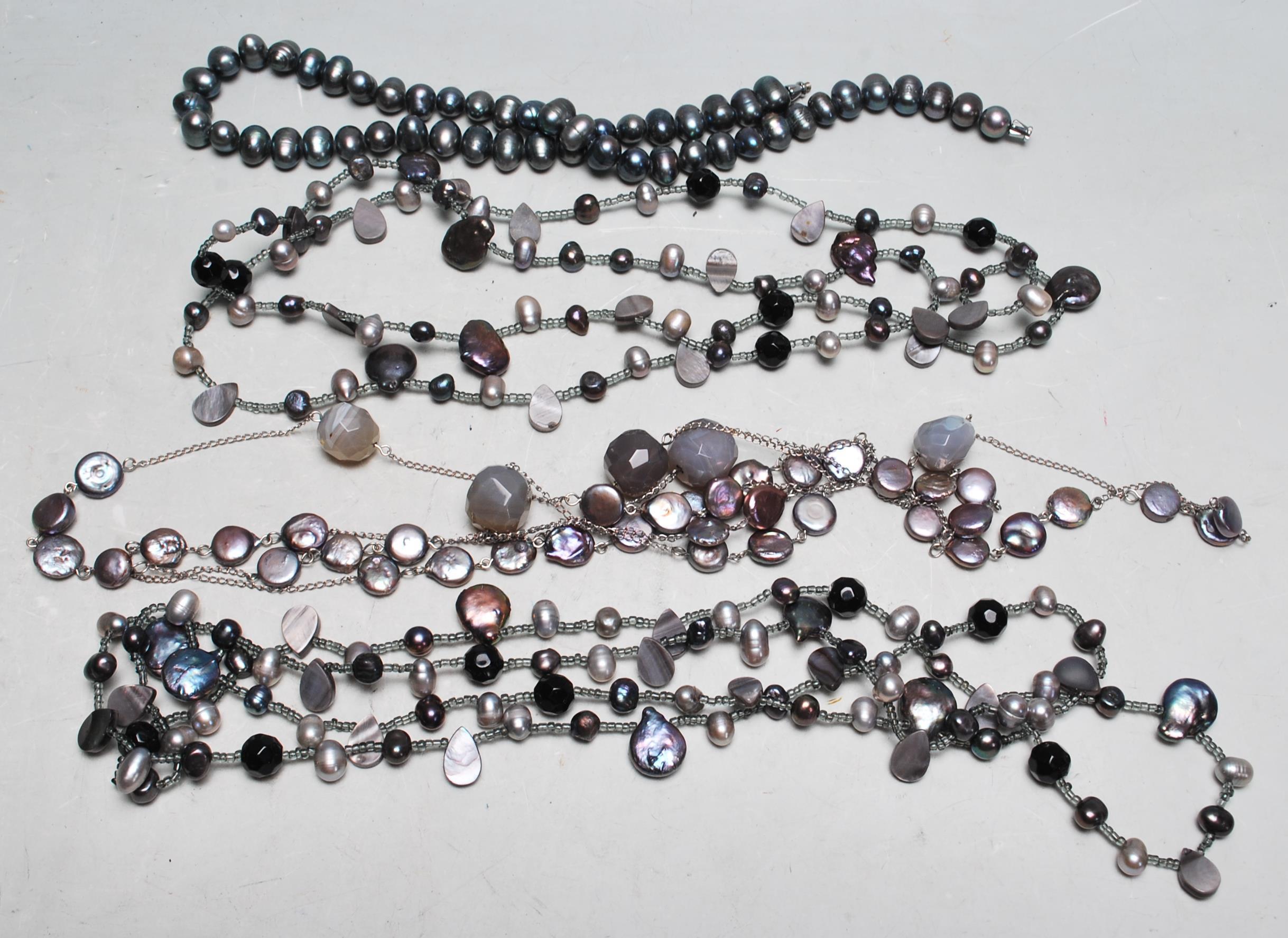 FOUR CONTEMPORARY PEARL NECKLACES