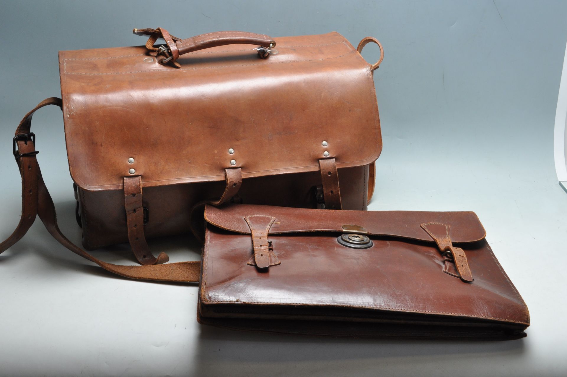 TWO MID CENTURY BROWN LEATHER BAGS