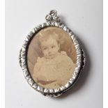 ANTIQUE SILVER PLATED PHOTO LOCKET