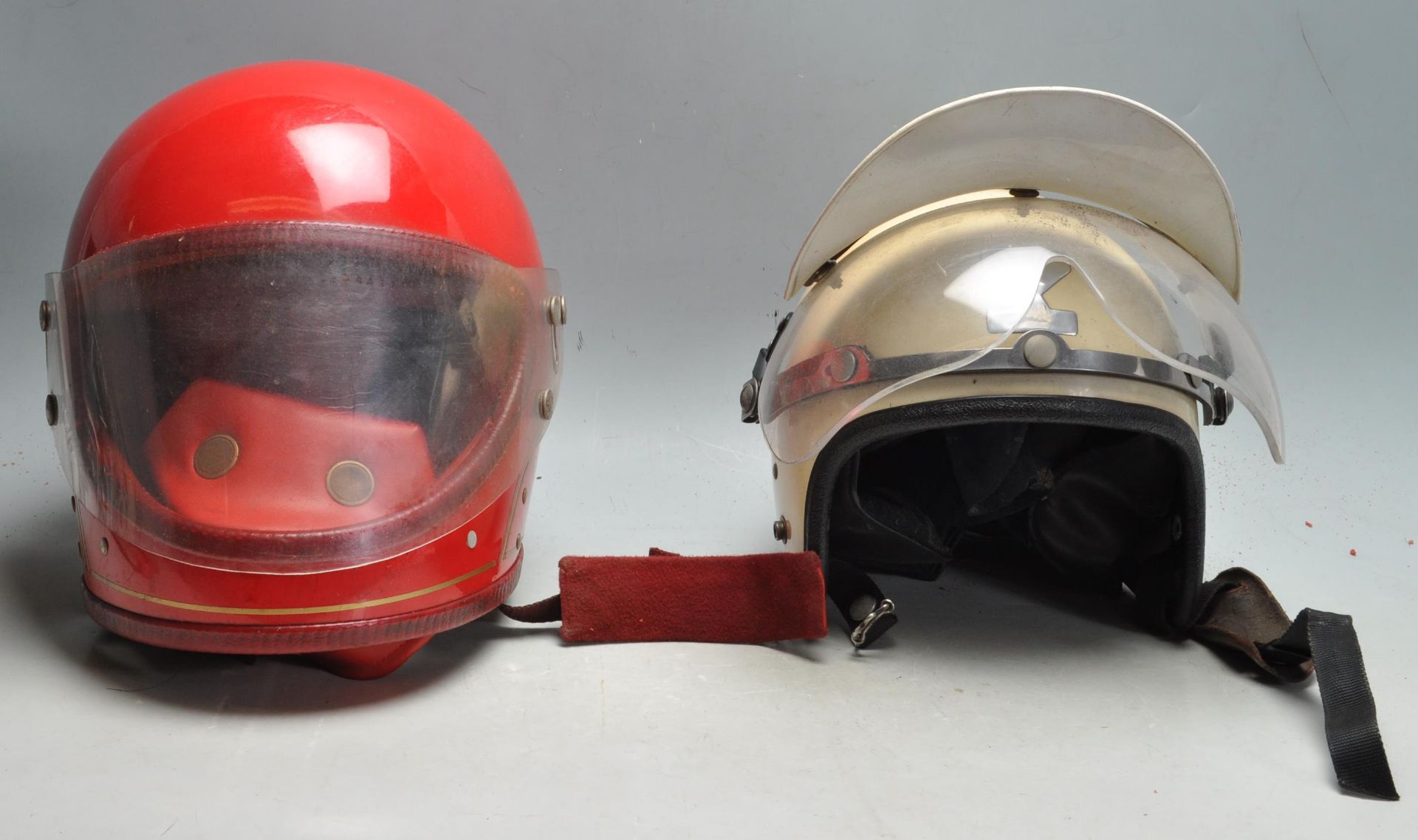 TWO VINTAGE 20TH CENTURY MOTORCYCLE HELMETS