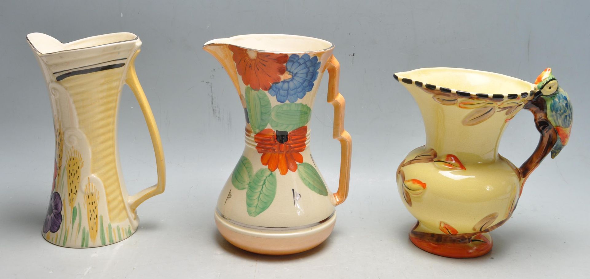 COLLECTION OF THREE ART DECO EARLY 20TH CENTURY JUGS