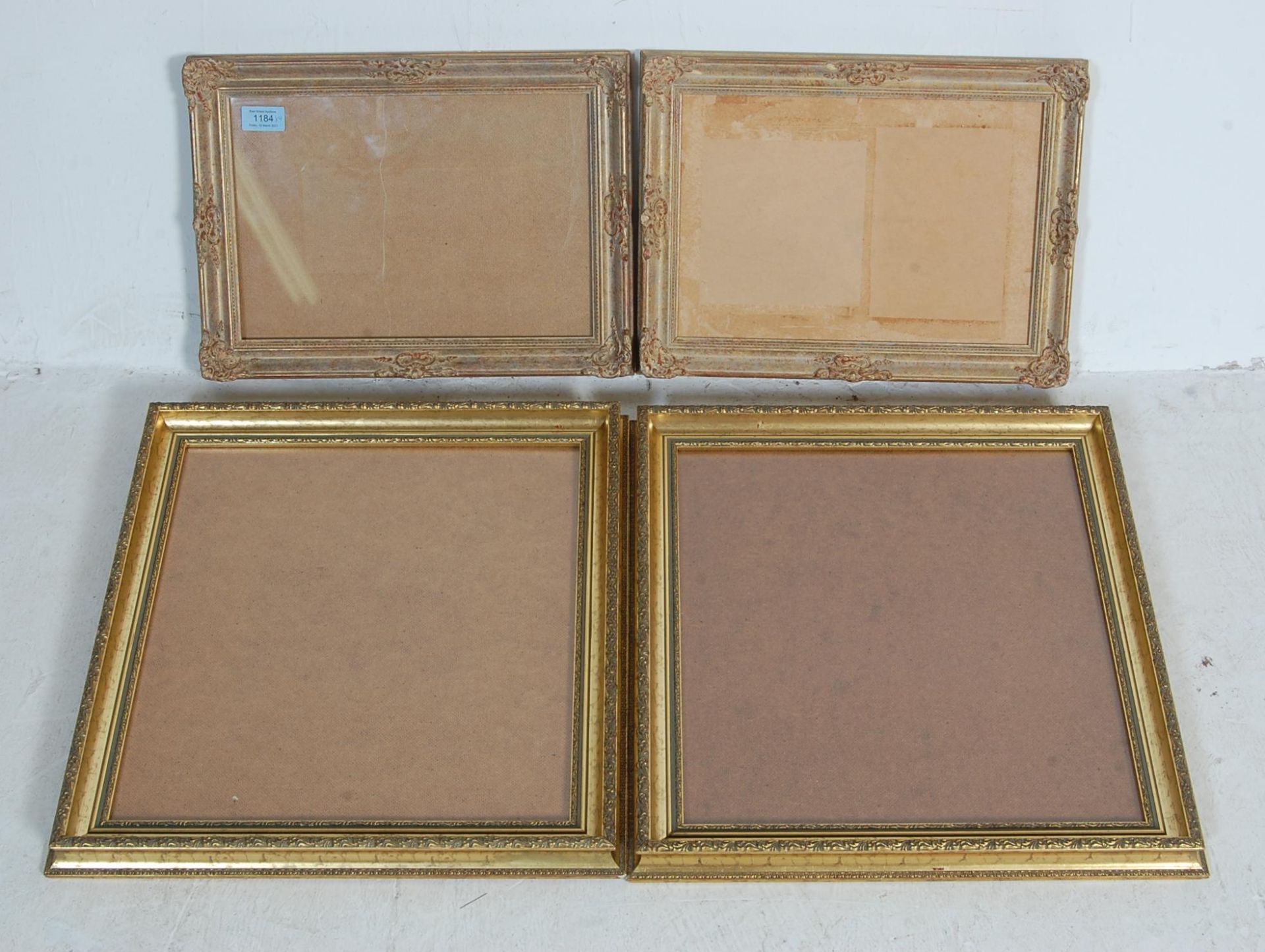 FOUR VINTAGE 20TH CENTURY BAROQUE STYLE GILDED PICTURE FRAMES