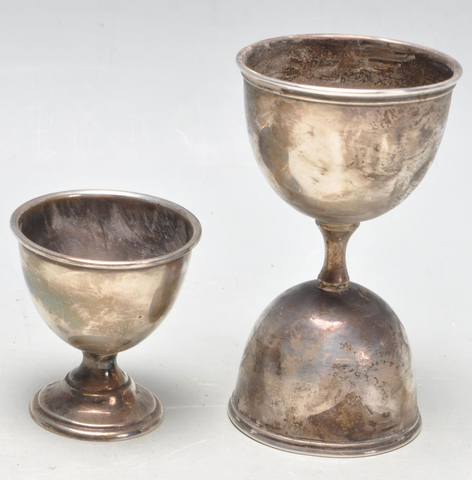 TQO ANTIQUE EARLY 20TH CENTURY AND LATER HALLMARKED STERLING SILVER EGG CUPS