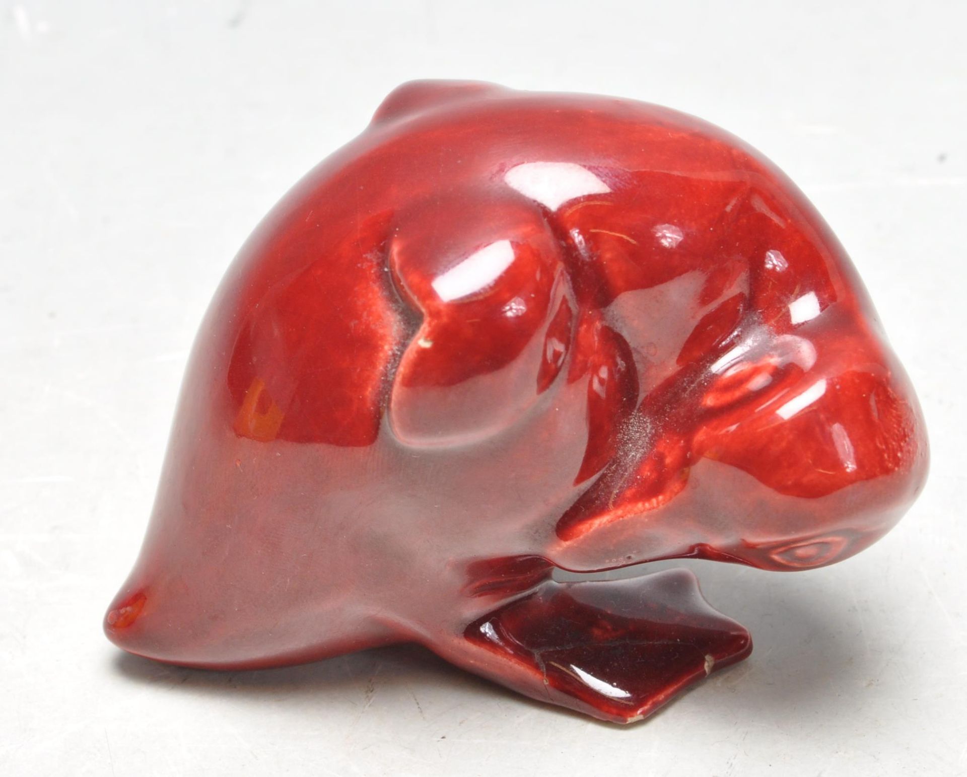 UNUSUAL EARLY 20TH CERAMIC DEEP RED FLAMBE GLAZED FIGURINE OF A DUCK