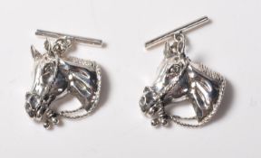 PAIR OF STAMPED STERLING SILVER CUFFLINKS IN THE FORM OF RACING HORSES