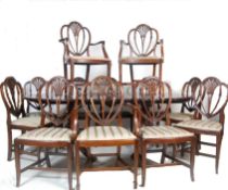 MATCHED SET OF 12 RGENCY REVIVAL MAHIOGANY HEPPLEWHITE DINING CHAIRS AND TABLE