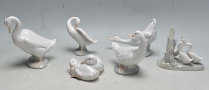 COLLECITON OF SIX LATE 20TH CENTURY PORCELAIN FIGURINES BY NAO & LLADRO