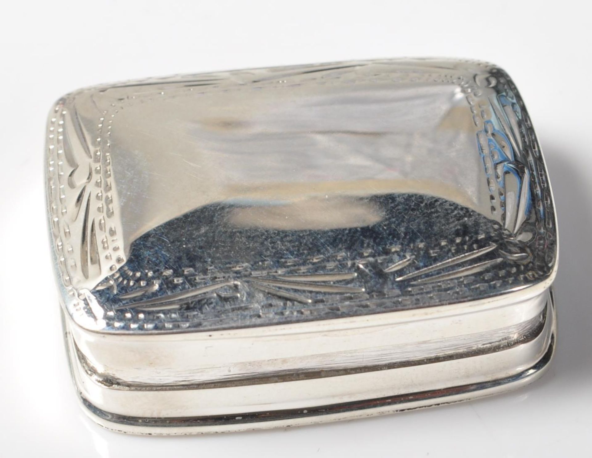 STAMPED .925 SILVER PILL BOX WITH ETCHED FOLIATE DECORATION