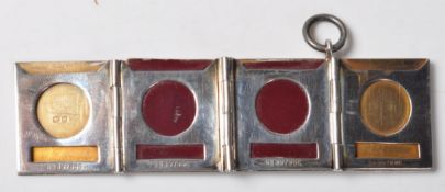 GRIFFITH & SONS SILVER STAMP CASE PENDANT