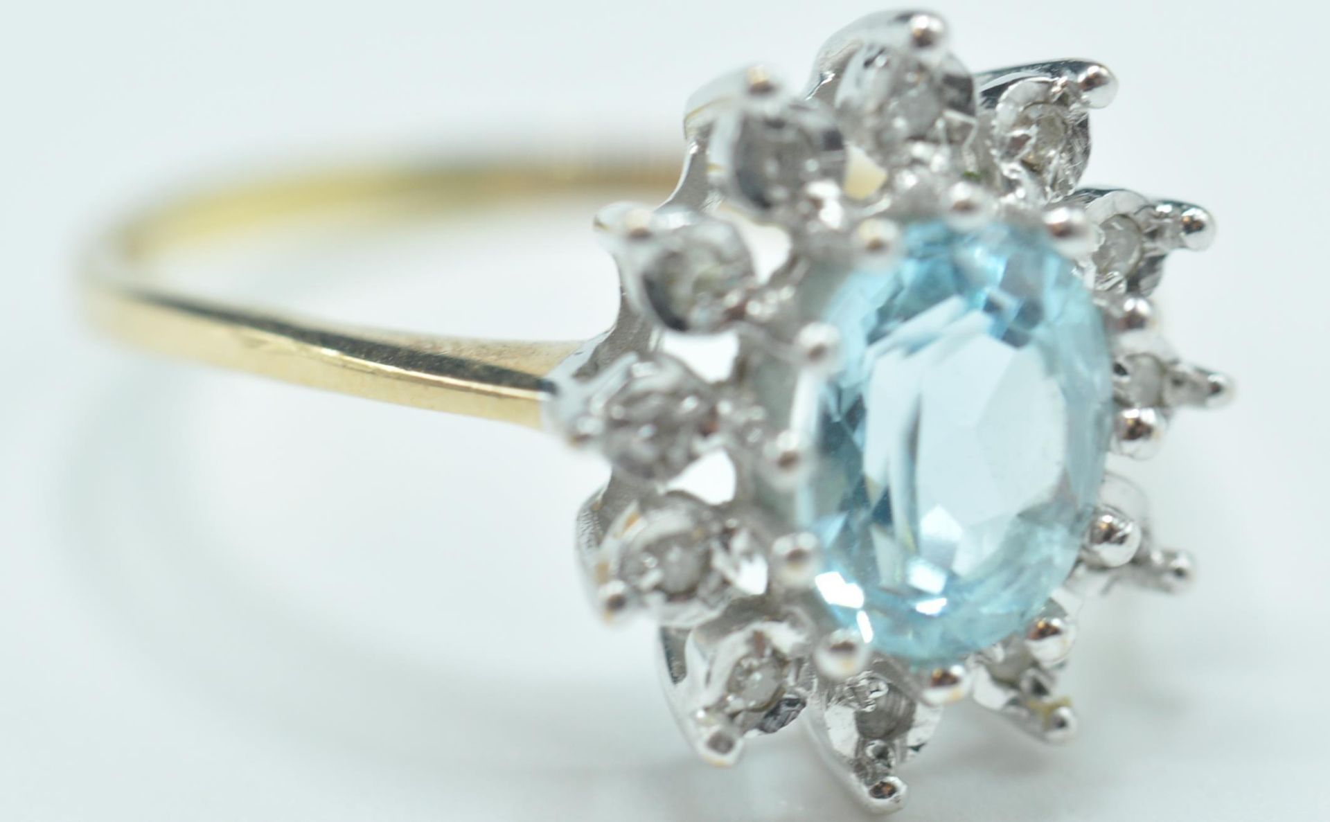 9CT GOLD AQUAMARINE & DIAMOND CLUSTER RING