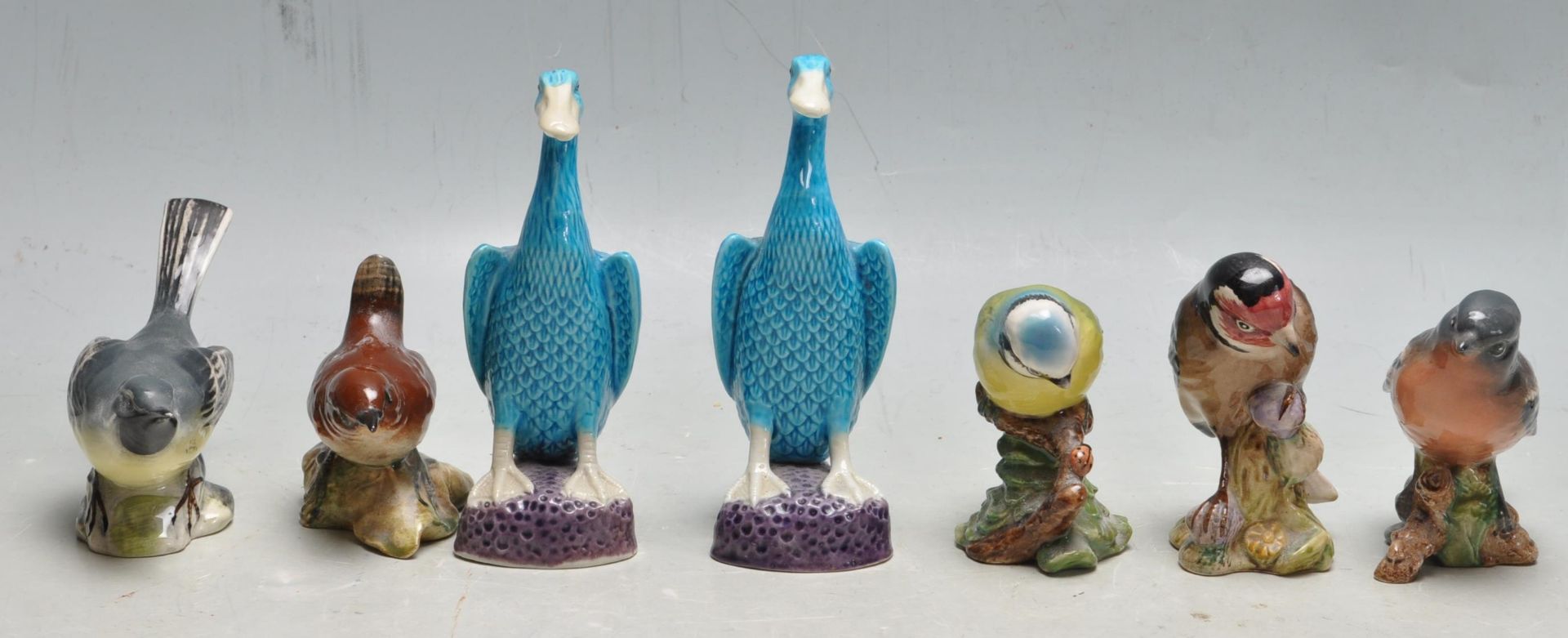 TWO EARLY 20TH CENTURY CHINESE PORCELAIN TURQUOISE DUCKS AND FIVE BESWICK BIRD FIGURINES