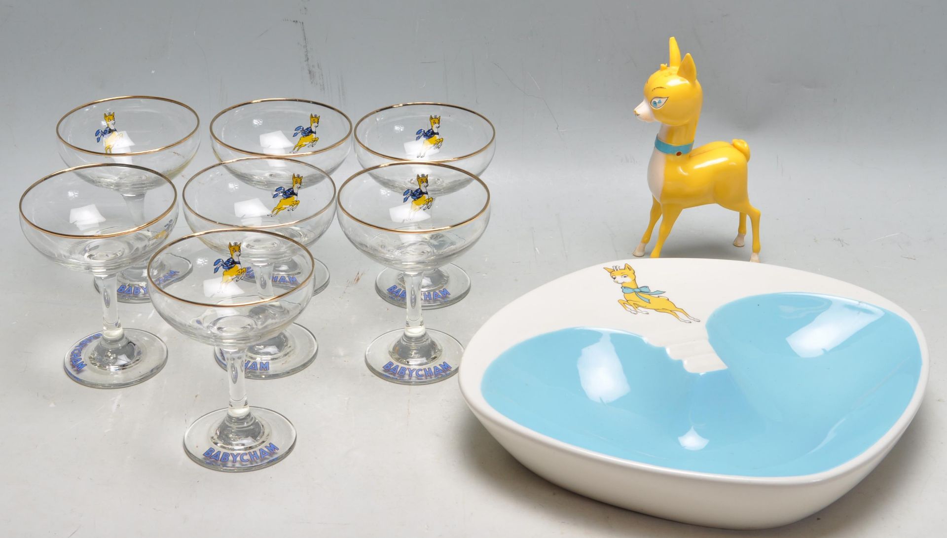 SEVEN RETRO 20TH CENTURY BABYCHAM GLASSES, LARGE ASHTRAY AND PLASTIC FIGURINE