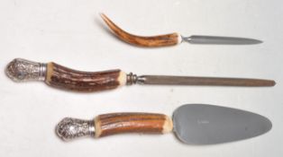 A GOOD QUALITY VINTAGE ANTLER HORN CARVING SET