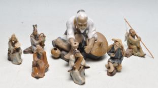 SEVEN VINTAGE 20TH CENTURY CHINESE MUDMEN FISHERMEN FIGURINES