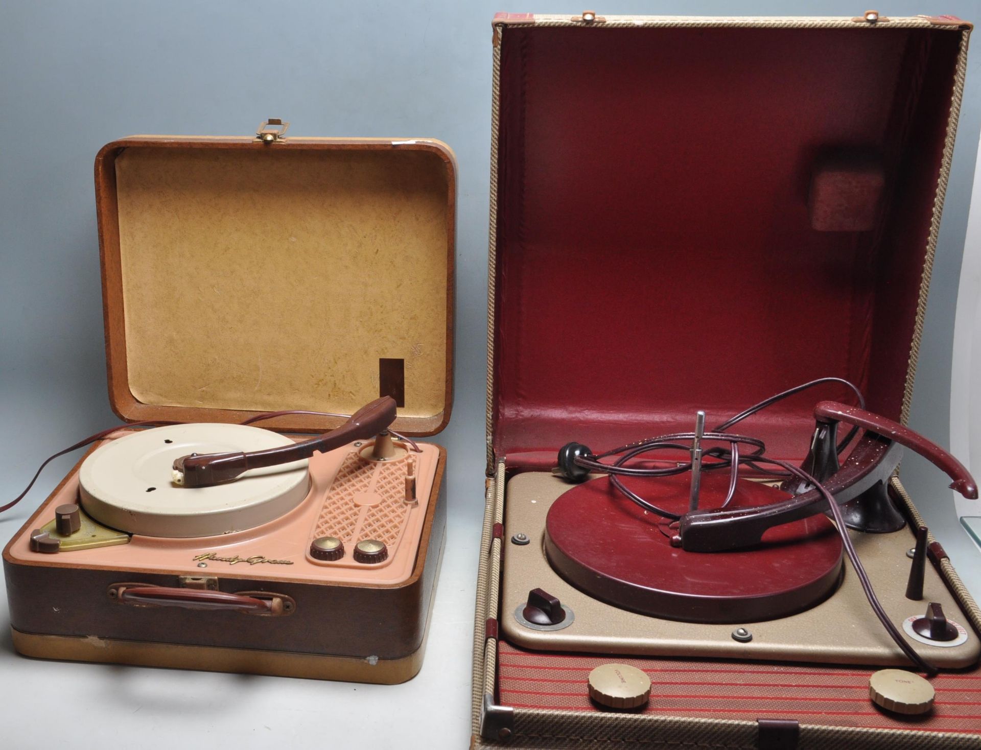 A PAIR OF VINTAGE RETRO 1960S RECORD PLAYERS TO INCLUDE A REGENTONE HANDY-GRAM