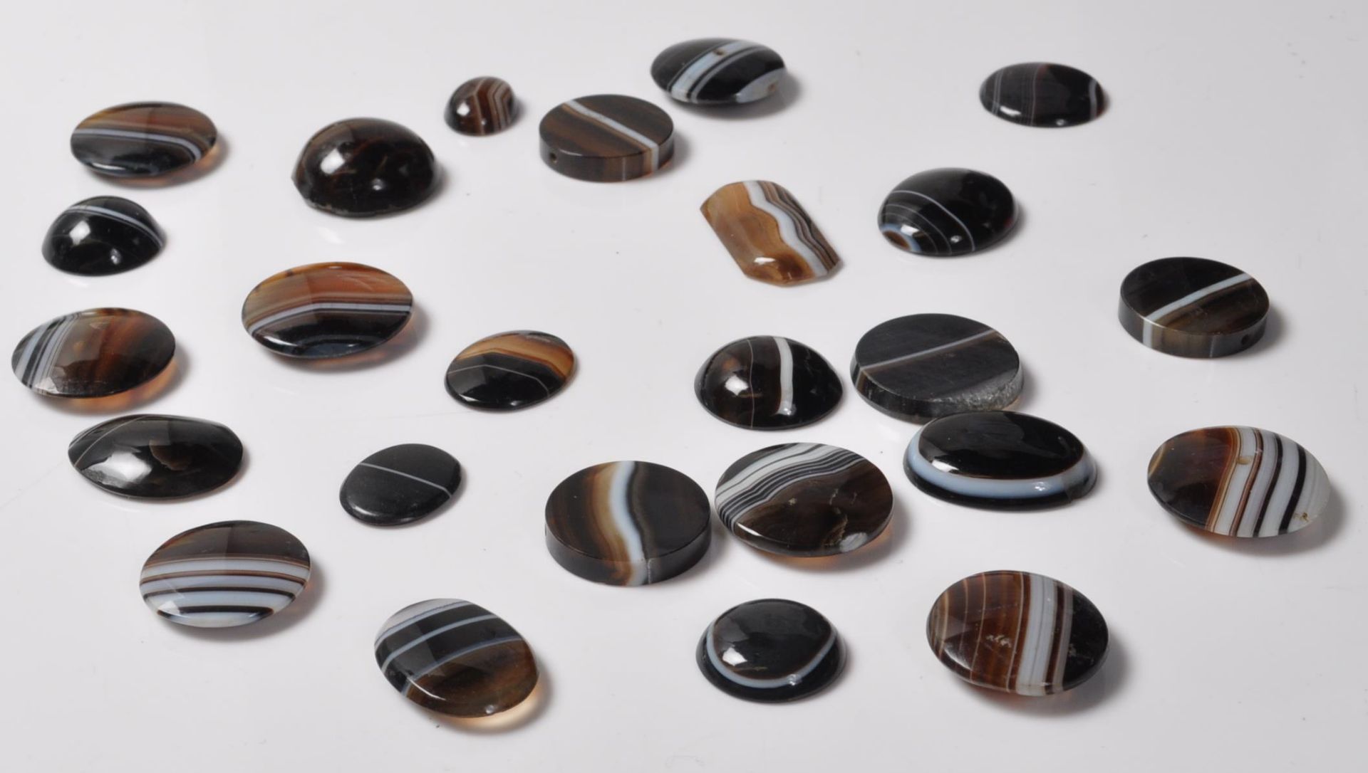 TWENTY FIVE VICTORIAN BANDED AGATE STONES