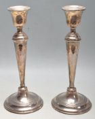 PAIR OF SILVER HALLMARKED CANDLESTICKS BY WILLIAM HUTTON & SONS LTD BIRMINGHAM