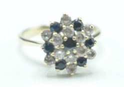 9CT GOLD BLUE AND WHITE STONE CLUSTER RING