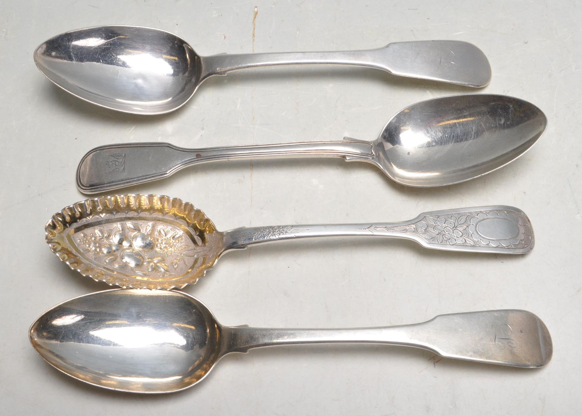 FOUR GEORGIAN / VICTORIAN SILVER SERVING SPOONS