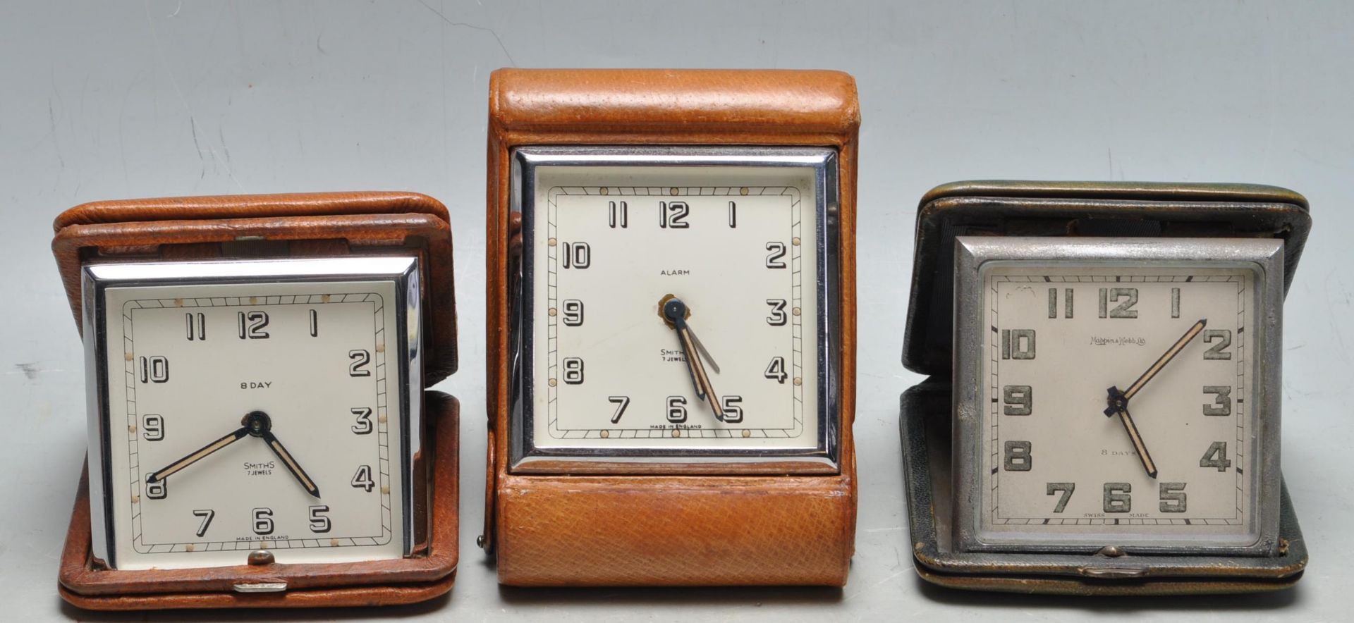 SET OF THREE VINTAGE 1950S MID 20TH CENTURY LEATHER BOUND TRAVEL CLOCK