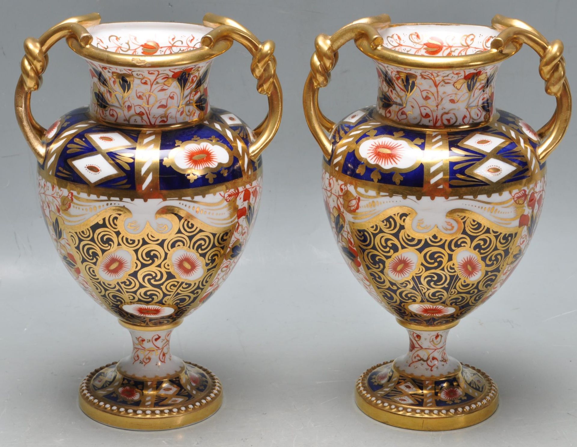 PAIR OF 19TH CENTURY VICTORIAN IMARI PATTERN VASES