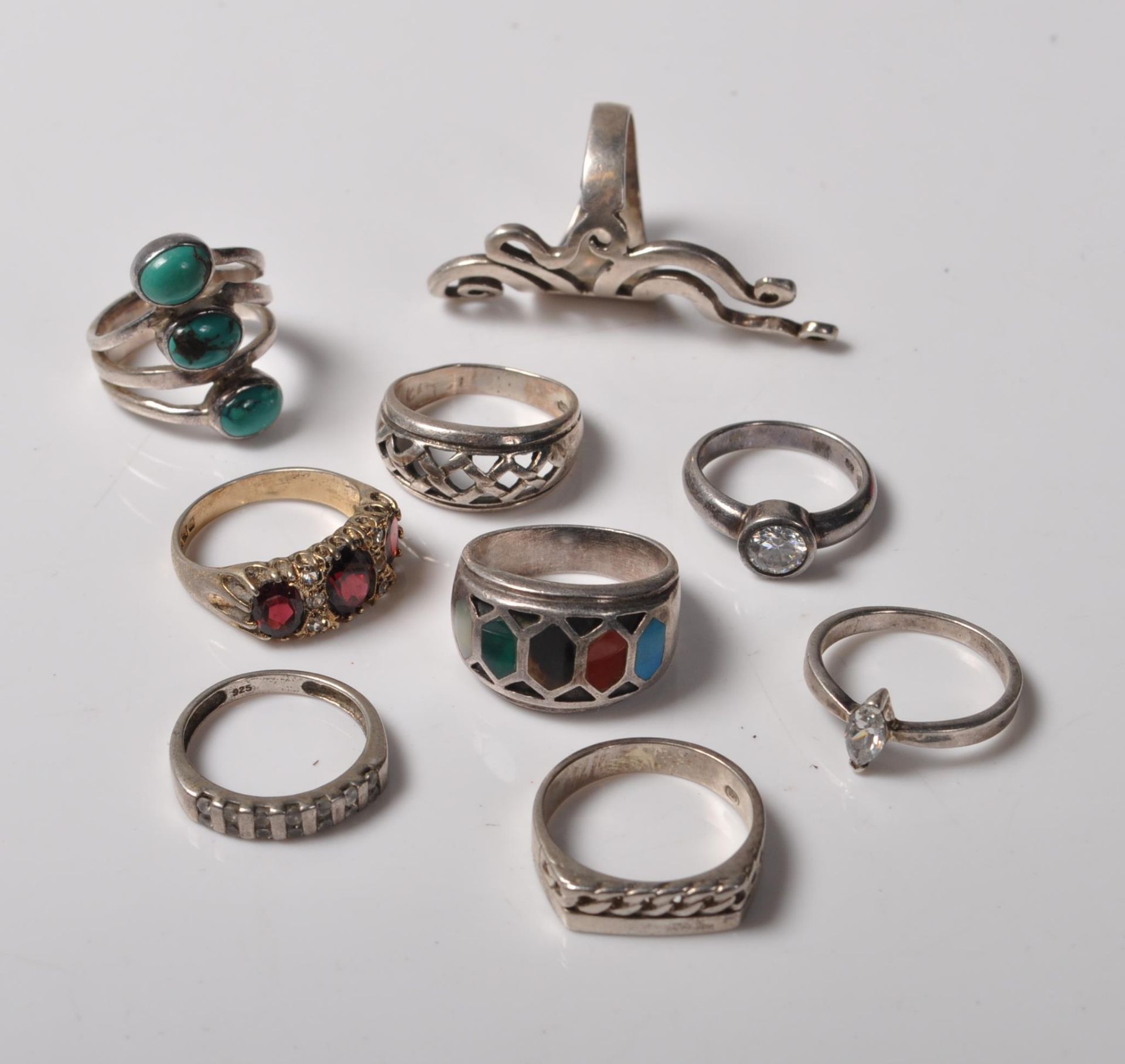 NINE MIXED CONTEMPORARY SILVER RINGS