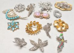 GROUP OF FIFTEEN MID CENTURY BROOCHES