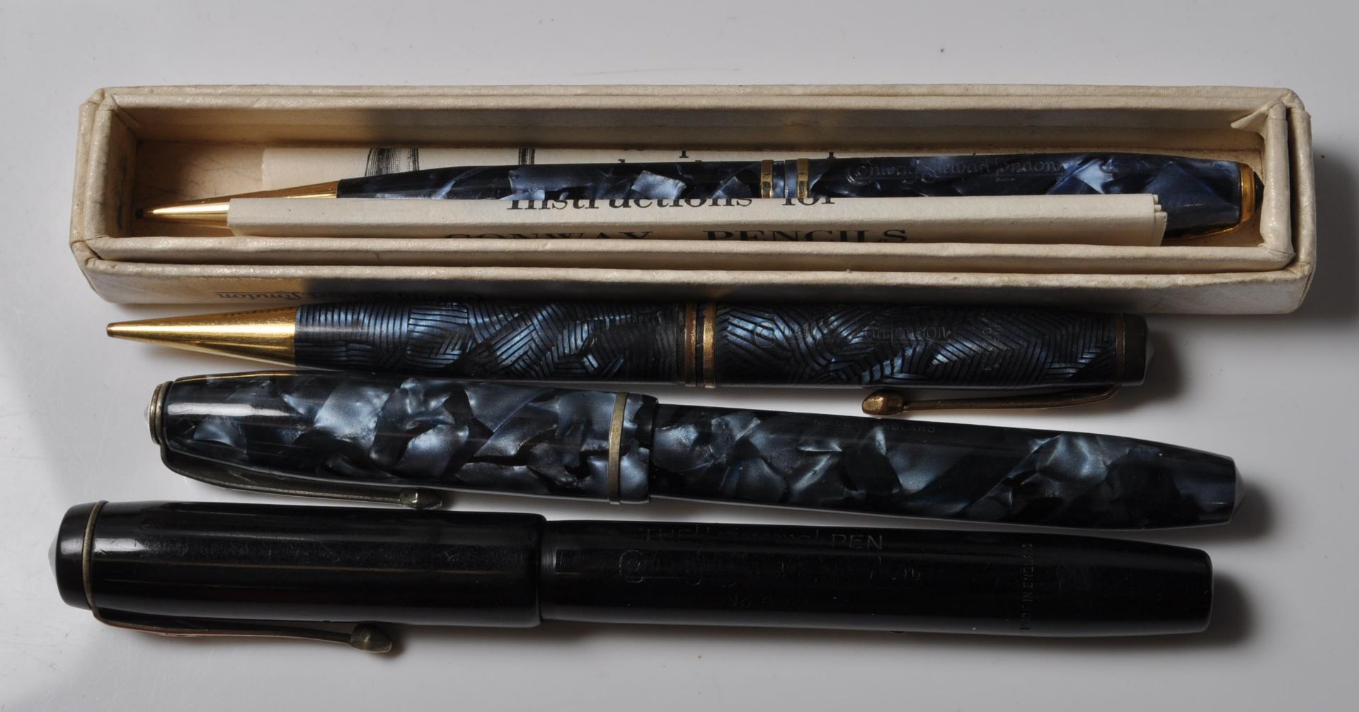 FOUR VINTAGE CONWAY FOUNTAIN PENS AND PENCILS