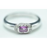9CT WHITE GOLD AND PINK STONE RING