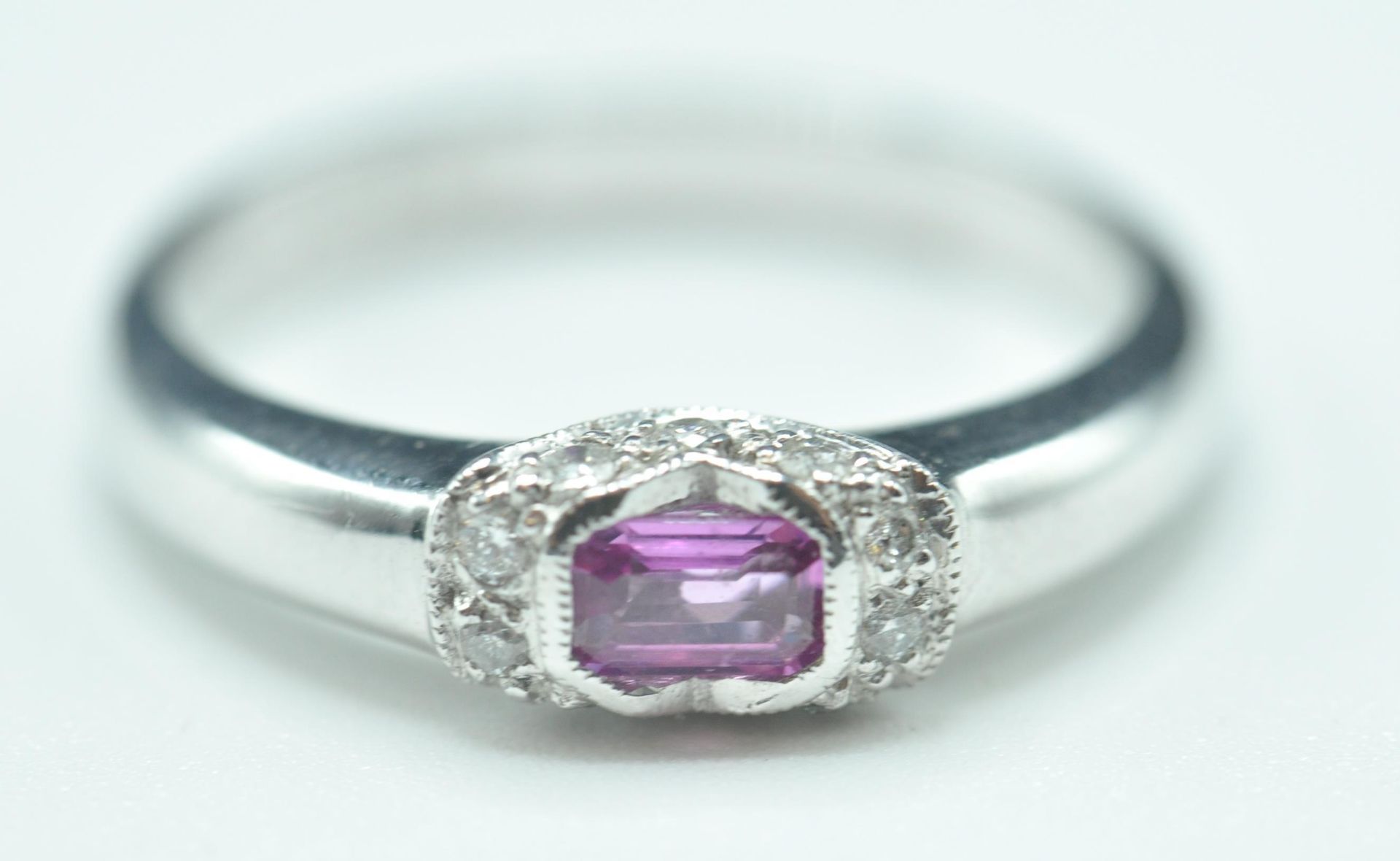 9CT WHITE GOLD AND PINK STONE RING