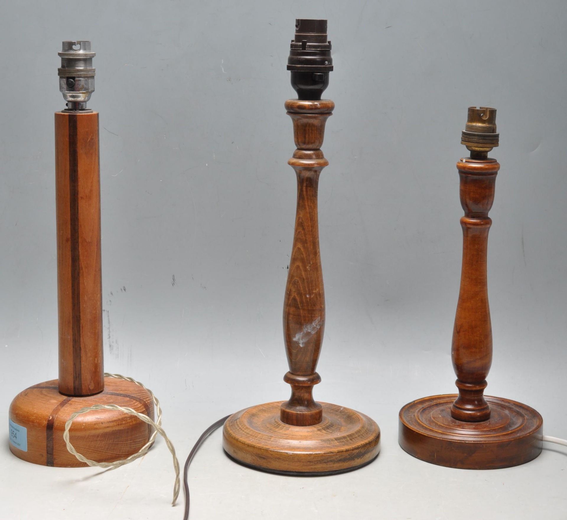 THREE VINTAGE 20TH CENTURY TEAK WOOD DESK LAMP BASES