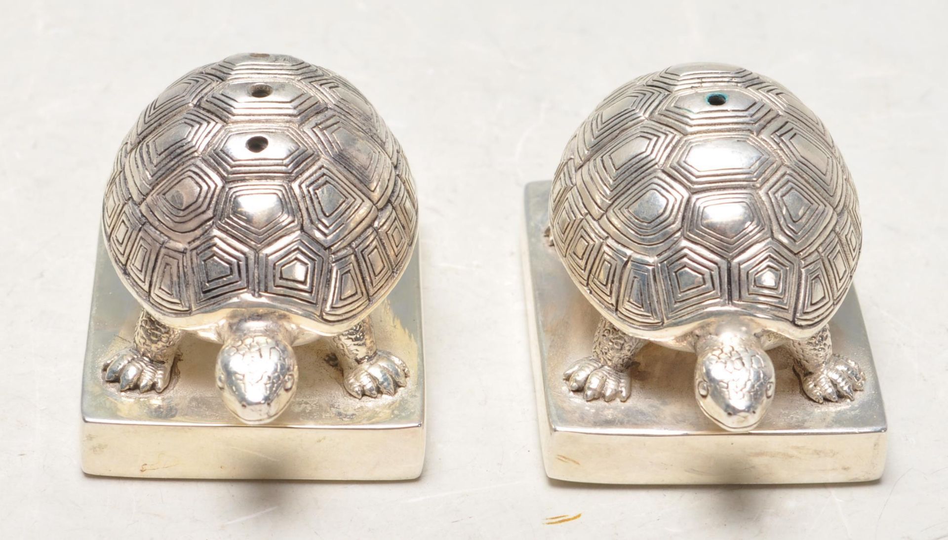 PAIR OF STAMPED .925 SILVER PLATE TORTOISE SALT AND PEPPER