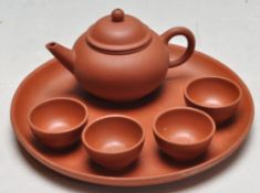 CHINESE RED CLAY YIXING ZISHA TEAPOT AND BOWLS