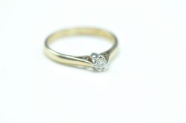 9CT GOLD AND WHITE STONE SOLITAIRE RING