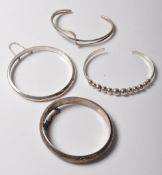 COLLECTION OF FOUR STAMPED .925SILVER BRACELETS