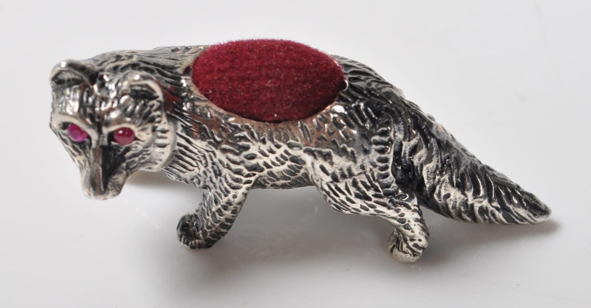 STAMPED STERLING SILVER PINCUSHION IN THE FORM OF A FOX