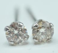 PAIR OF 14CT WHITE GOLD AND DIAMOND STUD EARRINGS