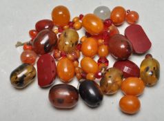 GROUP OF VINTAGE BEADS INCLUDING AMBER