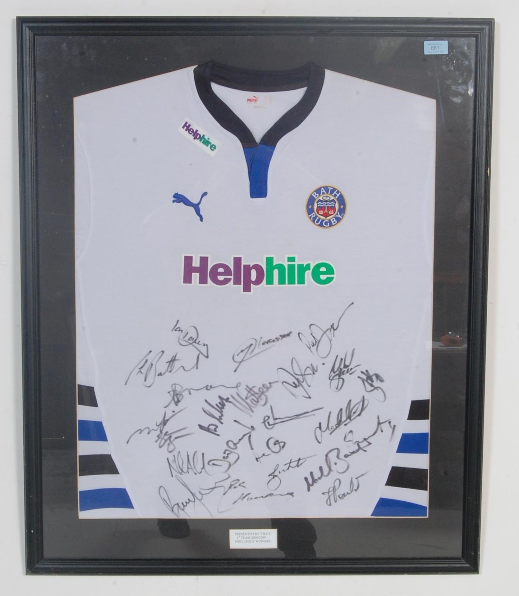 A signed and framed Bath Rugby shirt being well framed and presented bearing notation box for 1st