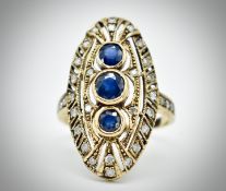 A 9ct Yellow Gold Sapphire & Diamond Navette Ring